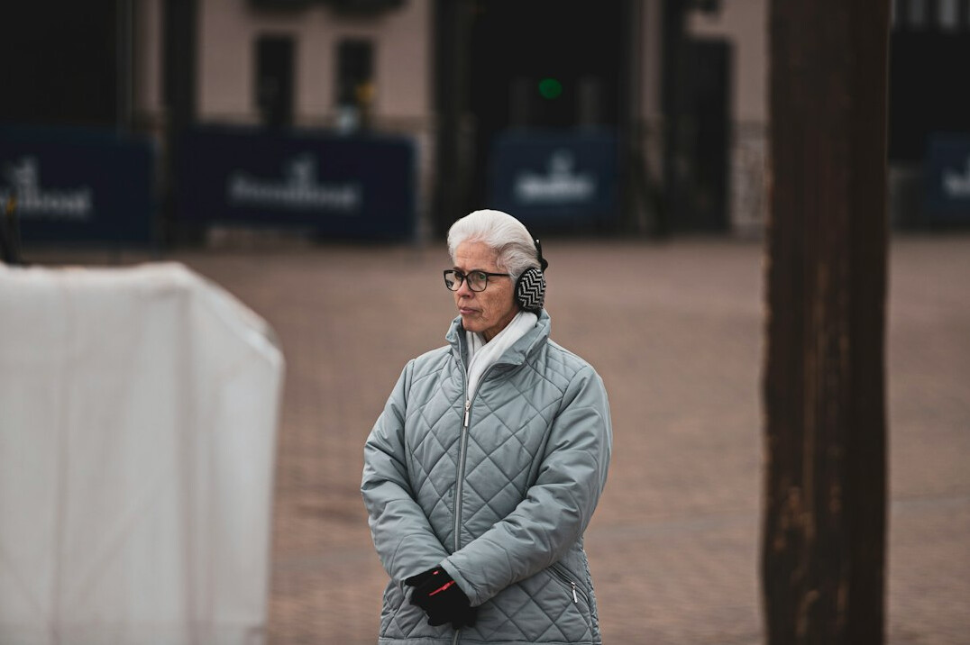 Elderly Danish woman sharing her story at home