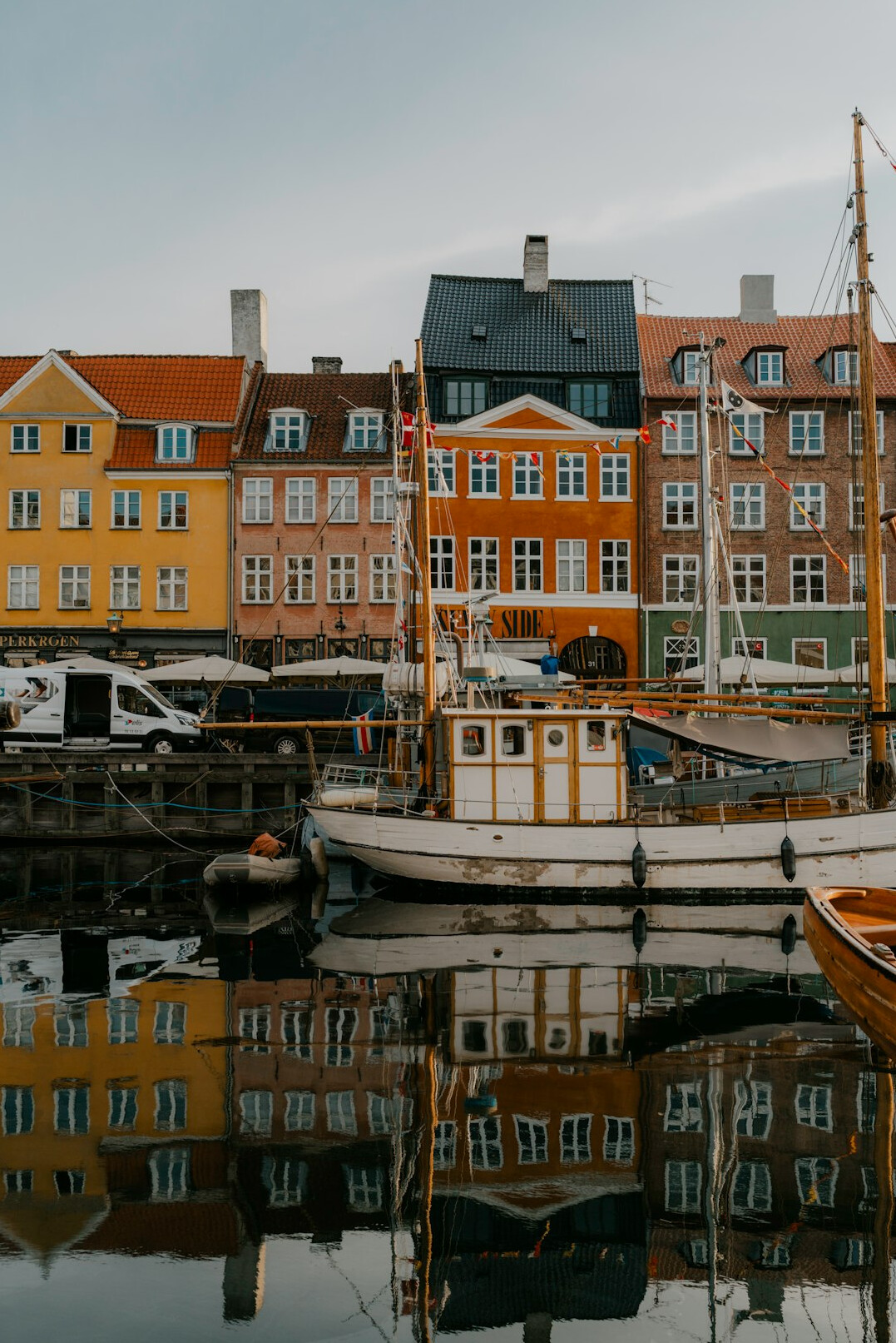 Colorful harbor houses along a Danish waterfront